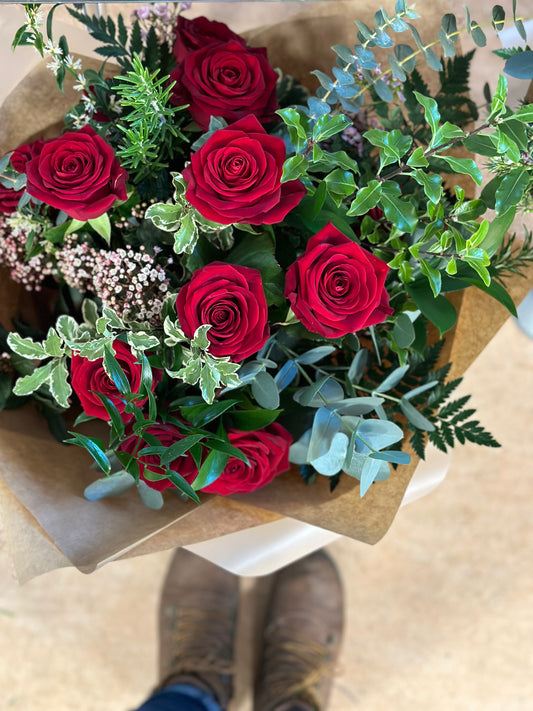 12 Red Roses (With extra foliage)
